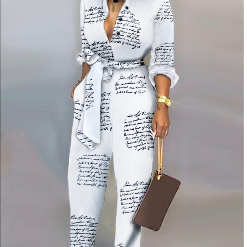 Brand new jumpsuit with belt.